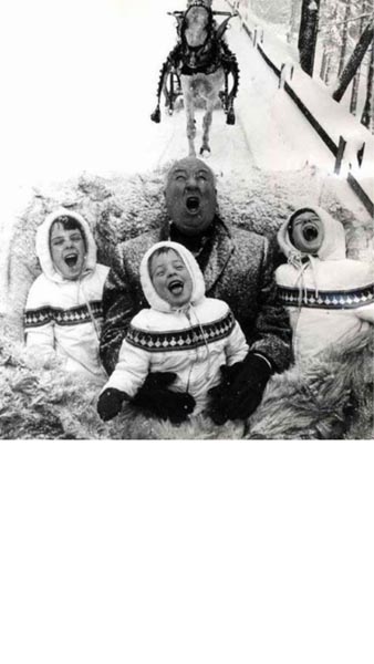 Alfred Hitchcock and his grandchildren having snowflakes instead of cornflakes.